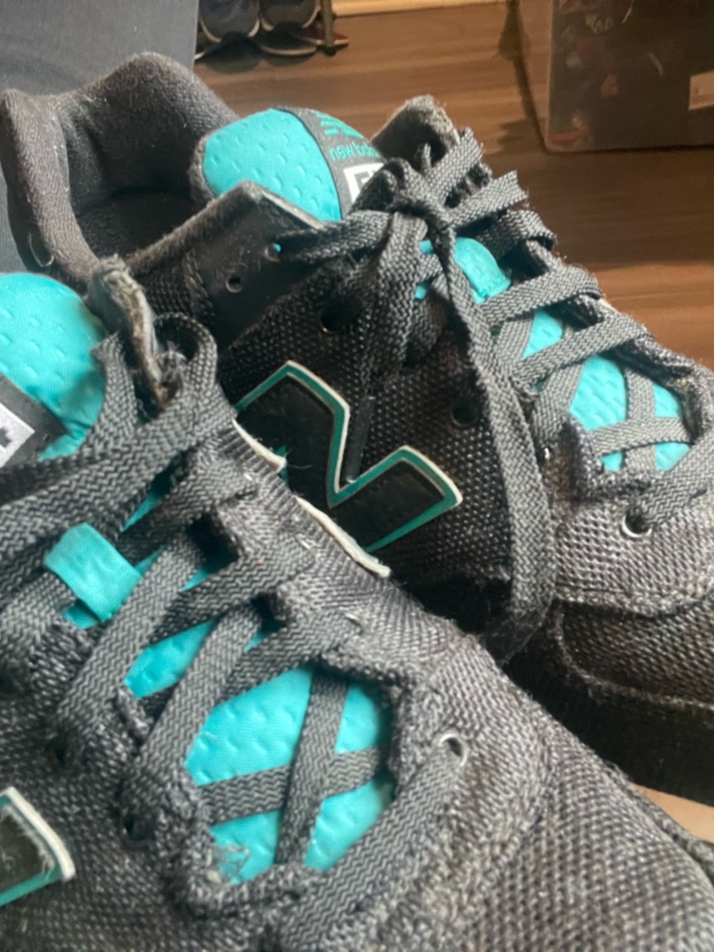 New Balance Men’s Black Sneakers with Teal Accents - Picture 4 of 6